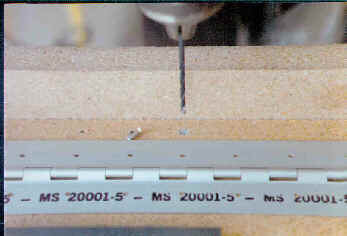 Drilling tab hinge